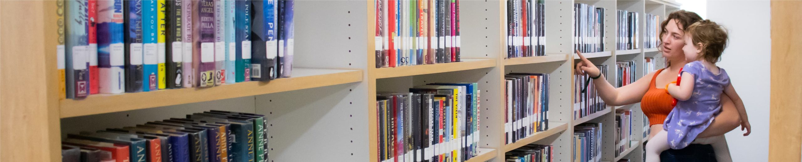 Child with parent in library