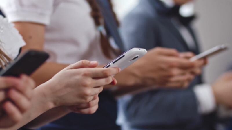 People on cellphones